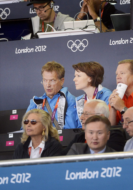  President Sauli Niinistö and Mrs Jenni Haukio following the match of judoka Valtteri Jokinen in the men’s under 60 kg division on Saturday, 28 July 2012.  Photo: Lehtikuva 