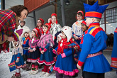  Mrs Haukio greets children who have come to meet her in the yard of Siida. Photo: Matti Porre/Office of the President of the Republic of Finland 