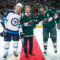 Finnish President Sauli Niinisto poses for a photo with Matt Hendricks #15 of the Winnipeg Jets and Matt Cullen #7 of the Minnesota Wild after the ceremonial puck drop prior to the game at Xcel Energy Center.  kuva: Courtesy of Minnesota Wild/Bruce Kluckhohn