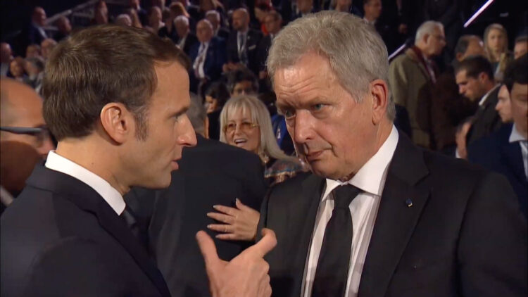 President Niinistö discussing with President of France Emmanuel Macron. Photo: Nad Vashem web stream