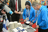  Coffee and cake for Finland's first medallist in Sochi was the high point of the Finnish reception: silver medallist Enni Rukajärvi and President Niinistö cutting the cake. Copyright © Office of the President of the Republic
