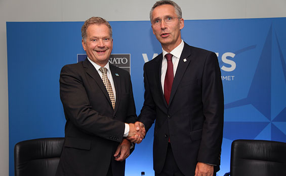 NATO Secretary General Anders Fogh Rasmussen (left) and Prime Minister David Cameron of the UK welcomed President Sauli Niinistö to the NATO summit.